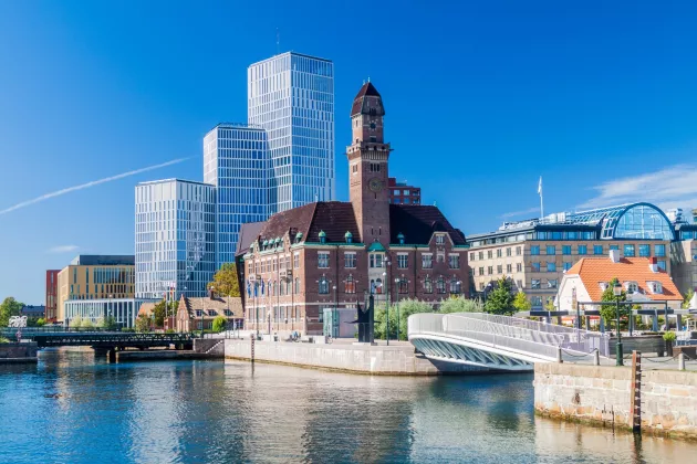 Photo of Malmö. Blue sky the canal and the towers of Malmö Live. 