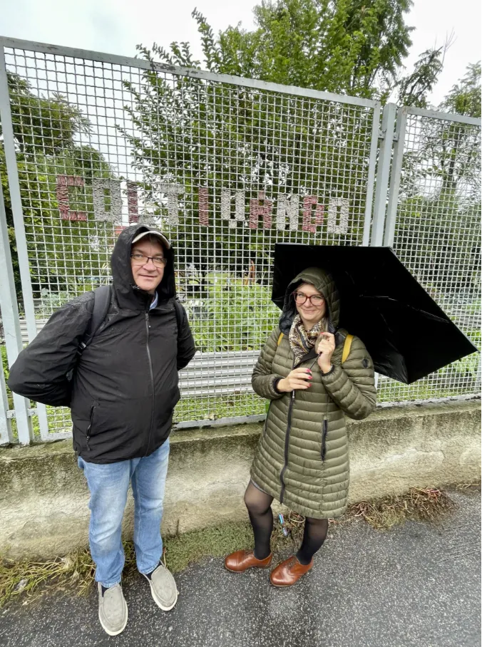 Two persons and an umbrella